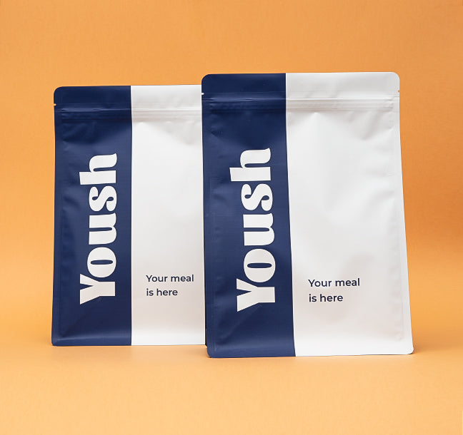 two yoush products in boxes on orange background
